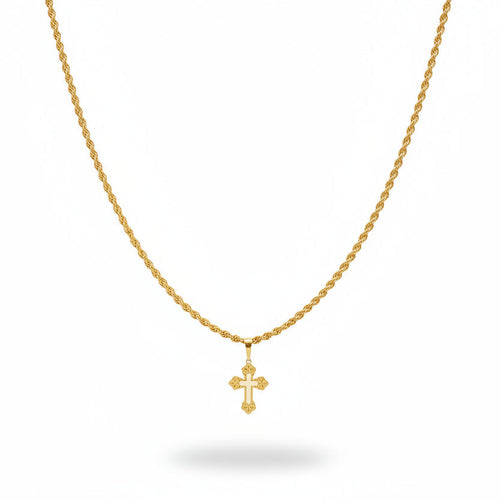 Gold necklace with cross pendant on a black velvet stand