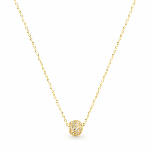 Gold necklace with a round pendant on a white background